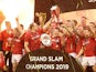 Wales players celebrate completing the Grand Slam and winning the Triple Crown and Six Nations Championship with the trophies