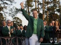 Danny Willett celebrates in the green jacket after winning the 2016 The Masters golf tournament at Augusta National Golf Club