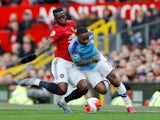 Manchester City's Raheem Sterling in action with Manchester United's Aaron Wan-Bissaka on March 8, 2020
