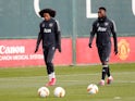 Manchester United's Tahith Chong and Timothy Fosu-Mensah pictured in March 2020