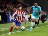 Atletico Madrid's Joao Felix in action with Osasuna's Pervis Estupinan in December 2019