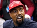 Kanye West wearing a MAGA hat in October 2018