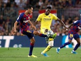 Barcelona's Sergio Busquets in action with Villarreal's Andre-Frank Zambo Anguissa in September 2019