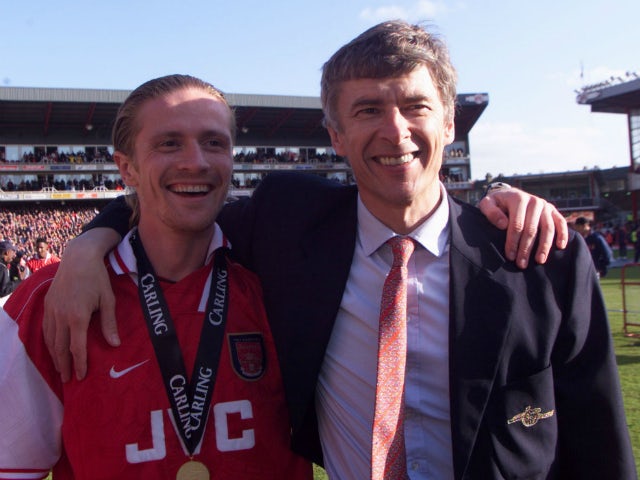Arsene Wenger and Emmanuel Petit pictured in May 1998