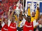 Arsenal lift the FA Cup at the Millennium Stadium on May 4, 2002