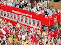 Arsenal celebrating their 2003-04 Premier League title success with their supporters