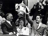 Tottenham Hotspur manager lifts the FA Cup with Danny Blanchflower in 1961