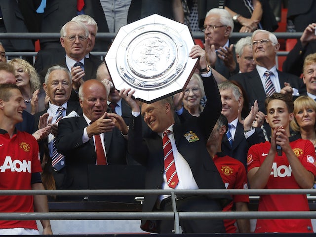 DavidMoyes lifts the Community Shield with Man Utd in 2013