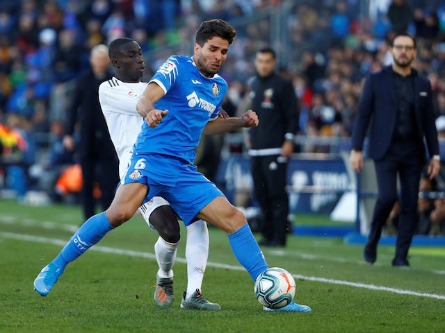 Leandro Cabrera in action for Getafe with Real Madrid's Ferland Mendy in La Liga on January 4, 2020