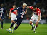 Paris Saint-Germain's Neymar in action with AS Monaco's Guillermo Maripan in January 2020
