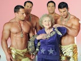 Betty White cavorts with shirtless men and a giant snake in the I'm Still Hot video