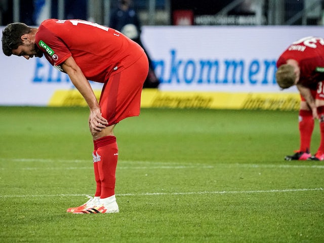 FC Koln players look dejected after their match against Hoffenheim on May 27, 2020