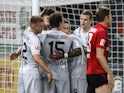 Bayer Leverkusen players celebrate Kai Havertz's goal against Freiburg on May 29, 2020
