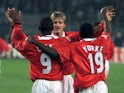 Manchester United trio David Beckham, Andy Cole and Dwight Yorke celebrate a goal against Juventus in April 1999