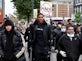 Anthony Joshua takes part in Black Lives Matter march on crutches