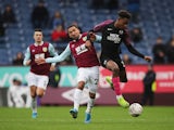 Peterborough United's Ricky Jade-Jones in action with Burnley's Aaron Lennon in January 2020