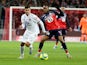 Lyon's Bruno Guimaraes in action with Lille's Renato Sanches in Ligue 1 on March 8, 2020