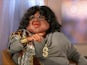 Leigh Francis portraying Oprah Winfrey in Bo in the USA