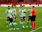 Real Betis players complain to the referee during their match against Sevilla on June 11, 2020
