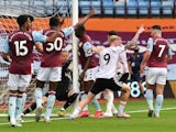 Aston Villa goalkeeper Orland Nyland catches the ball over the line against Sheffield United on June 17, 2020