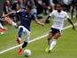 Said Benrahma of Brentford and Fulham's Michael Hector in action on June 20, 2020
