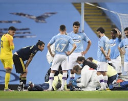 Man City's Eric Garcia suffers serious-looking injury in Ederson collision