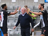Newcastle United manager Steve Bruce watches on as Andy Carroll comes on for Joelinton on June 24, 2020