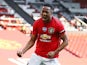 Manchester United forward Anthony Martial celebrates scoring his hat-trick against Sheffield United on June 24, 2020