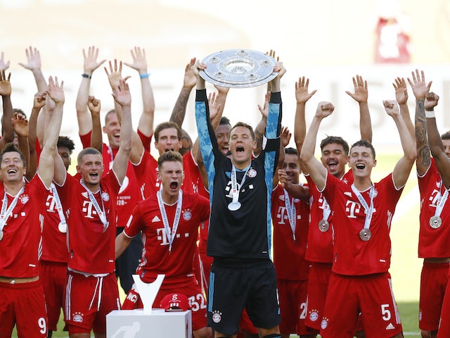 Bayern Munich goalkeeper Manuel Neuer lifts the Bundesliga trophy on June 27, 2020