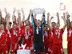 Bayern Munich goalkeeper Manuel Neuer lifts the Bundesliga trophy on June 27, 2020