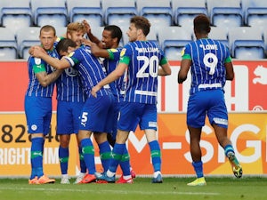 Wigan ease relegation fears with late win over Blackburn