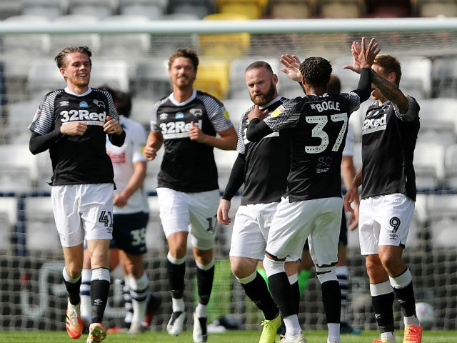 Derby County's players celebrate Wayne Rooney's freekick against Preston North End on July 1, 2020