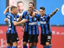 Inter Milan players celebrate with Ashley Young after he scored their opening goal in a win over Brescia