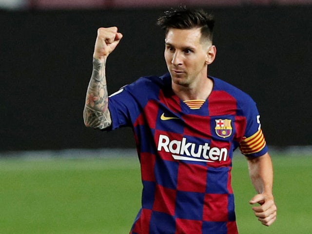 Barcelona captain Lionel Messi celebrates scoring his 700th goal in their match against Atletico Madrid on June 30, 2020