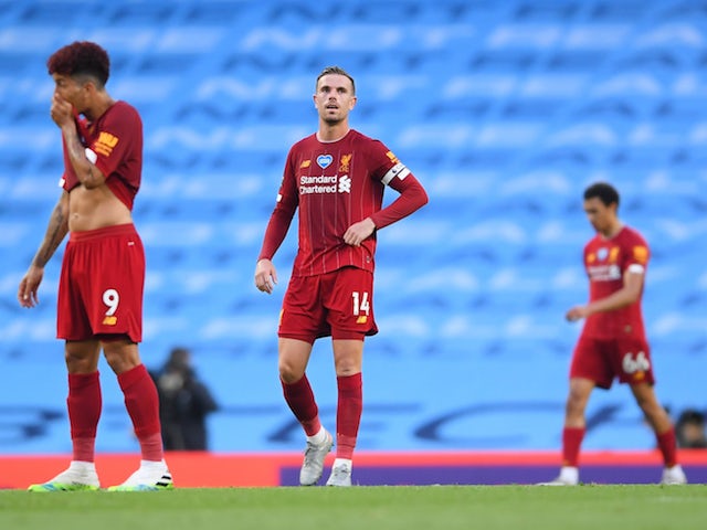 Liverpool players react to conceding a goal against Manchester City on July 2, 2020