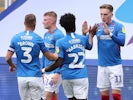 Portsmouth players celebrate scoring against Oxford United in the League One playoff semi-final on July 3, 2020