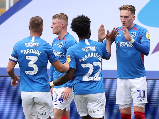 Portsmouth players celebrate scoring against Oxford United in the League One playoff semi-final on July 3, 2020