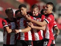 Southampton players celebrate Che Adams's goal against Manchester City on July 5, 2020