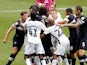 Swansea City and Luton Town players clash during a Championship clash on June 27, 2020