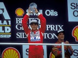 Ayrton Senna celebrates winning the 1988 British Grand Prix
