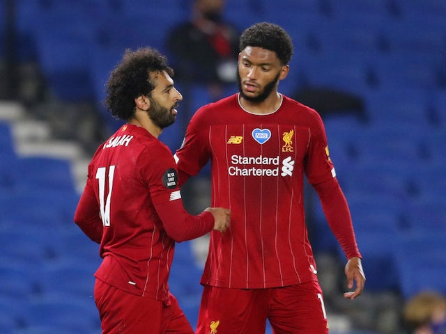 Mohamed Salah celebrates scoring Liverpool's third goal against Brighton & Hove Albion in the Premier League on July 8, 2020