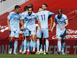 Burnley players celebrate Jay Rodriguez's equalising goal against Liverpool on July 11, 2020