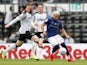 Brentford's Said Benrahma in action with Derby County's Wayne Rooney in the Championship on July 11, 2020