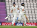 England's Joe Denly and Rory Burns run against West Indies on July 8, 2020