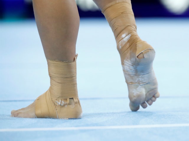 Gymnasts' legal claim over alleged abuse may be resolved without going to court
