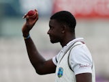 West Indies captain Jason Holder celebrates with the ball after career-best figures against England on July 9, 2020