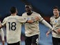 Manchester United pair Paul Pogba and Bruno Fernandes celebrate scoring against Aston Villa on July 9, 2020