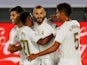 Real Madrid striker Karim Benzema celebrates with teammates after scoring against Alaves on July 10, 2020