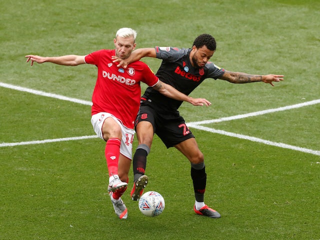 Bristol City's Andreas Weimann in action with Stoke City's Jordan Cousins in the Championship on July 15, 2020