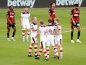Danny Ings celebrates with his Southampton teammates after scoring against Bournemouth on July 19, 2020